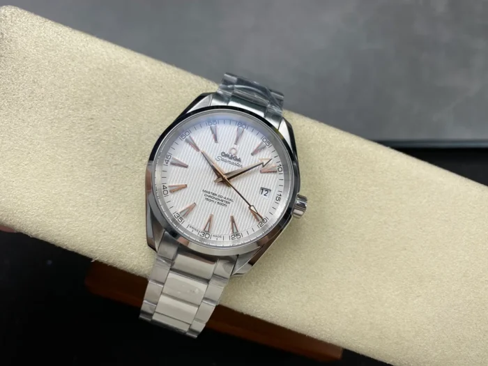 Watch on a display cushion, full bracelet, white and rose tone Aqua Terra