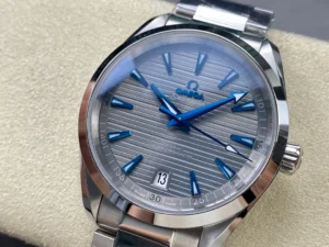 Grey dial from the left, blue arrow minute hand