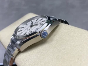 Crown side at an angle on the cushion, silver wave Aqua Terra