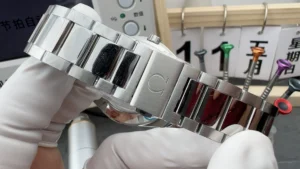 Clasp side of the bracelet in a gloved hand