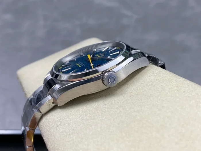Crown side on the cushion, yellow seconds hand in view