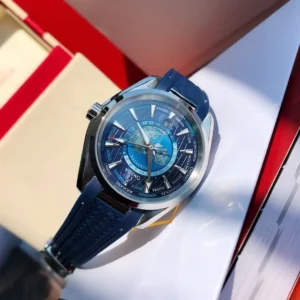 Dial at an angle in sunlight, blue strap folded below