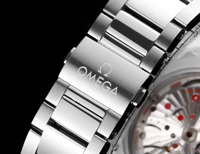 Clasp cover with OMEGA engraving, close view