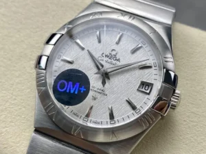 White textured dial from the left with a protective sticker on the glass