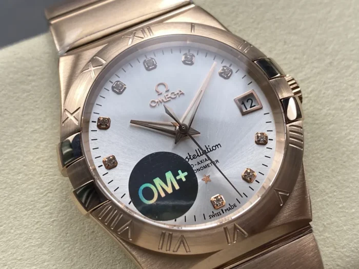 White sunray dial turned to the right, stone markers in rose gold tone settings catching the light
