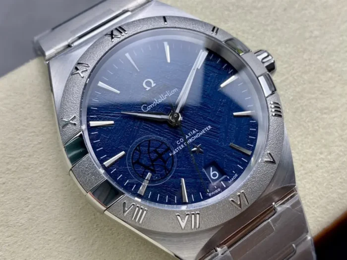 Blue textured dial in a meteorite style close up on the 41mm blue textured model, baton hour markers