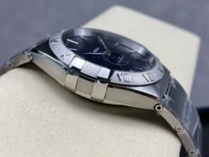 Left side of the 41mm blue textured model, one of the silver tone claws by the bezel