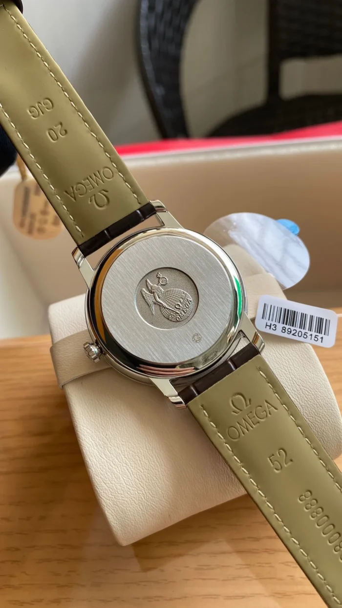 Solid seahorse caseback on a cushion with the strap lining
