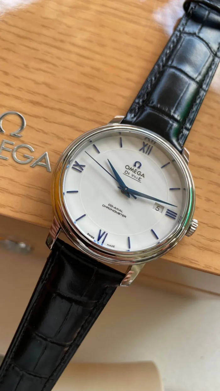Seen from the right on the black alligator pattern strap