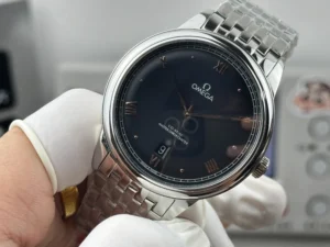 Black dial at an angle with rose gold tone hands