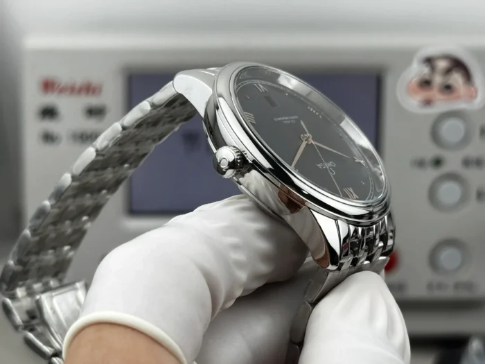 Crown side at an angle, black dial in the background