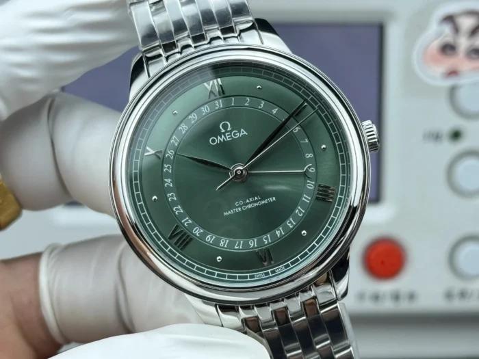 Green dial from the right, pointer date hand in view