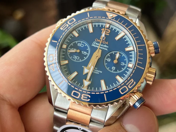 Omega Planet Ocean Chronograph 215.20.46.51.03.001 held in hand