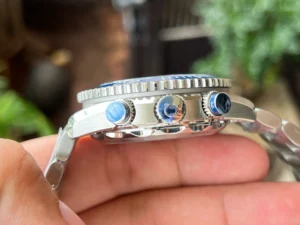 Side view of the crown and both pushers