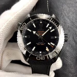 Omega Planet Ocean Deep Black 215.92.46.22.01.001 in a gloved hand
