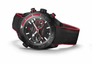 Watch lying on its side on white, red strap lining