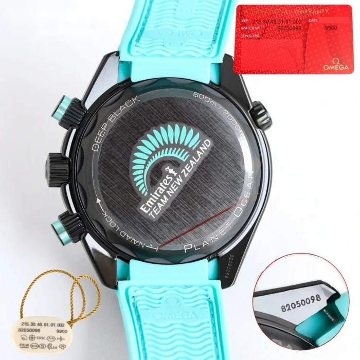 Caseback with the team logo, next to a hang tag and a red card