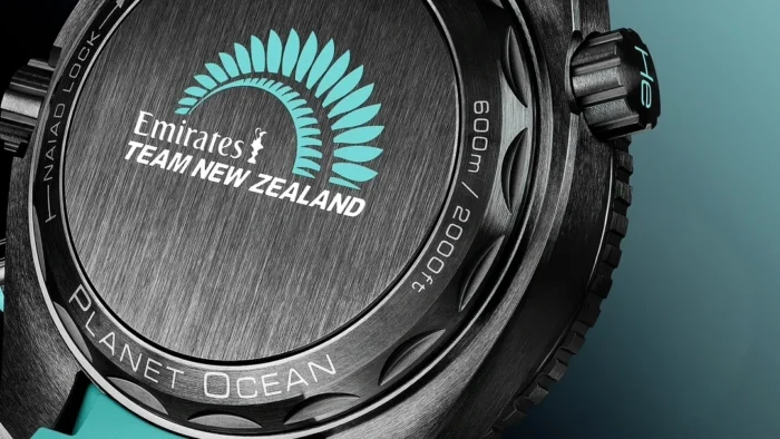 Close-up of the caseback with the team logo and Planet Ocean lettering