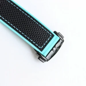 Black textile strap with turquoise stitching and the buckle