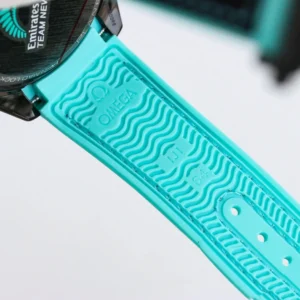 Turquoise rubber underside of the strap with the Omega logo