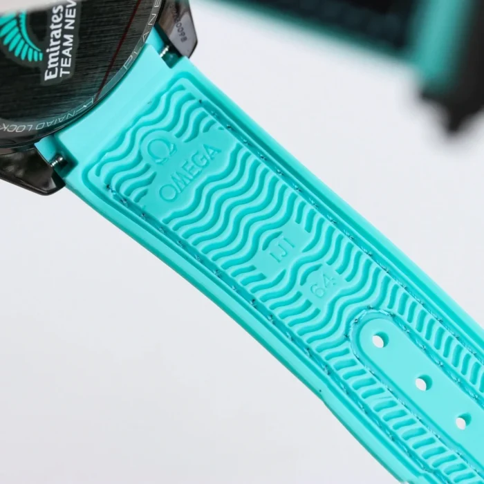 Turquoise rubber underside of the strap with the Omega logo