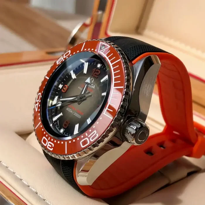 Crown side in the box, orange strap lining