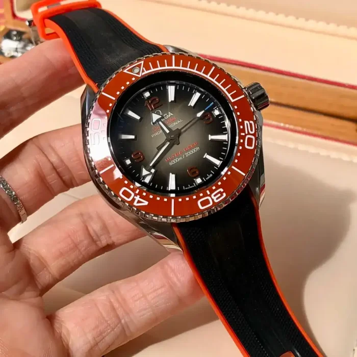 Omega Planet Ocean Ultra Deep 215.32.46.21.06.001 held in hand