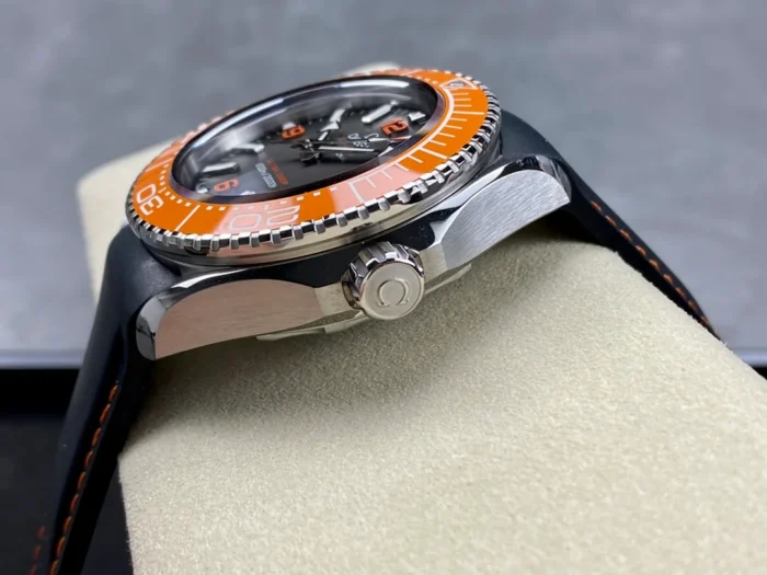 Crown side at an angle, orange bezel edge