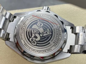 Solid caseback with the seahorse emblem and Planet Ocean engraving