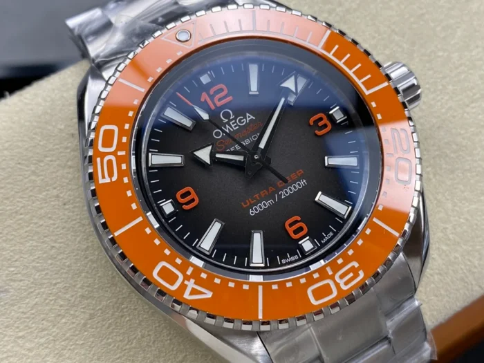 Dial from the left, orange bezel numerals