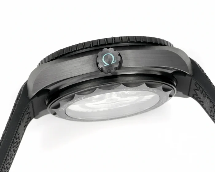 Crown side with a turquoise Omega symbol on the crown