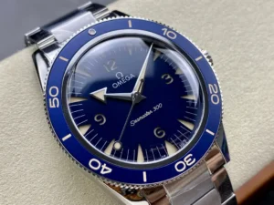 Dial from the right, broad arrow hour hand and blue bezel