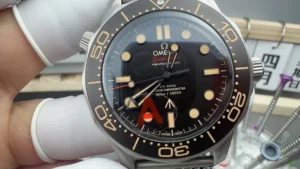 Omega Seamaster Diver 300M 210.90.42.20.01.001 dial close-up in hand