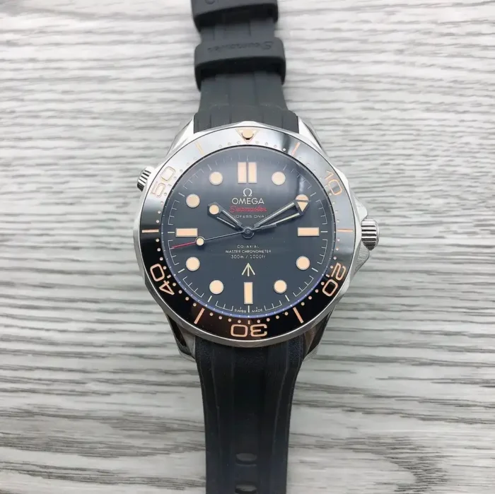 Front view on a wood grain surface, black rubber strap