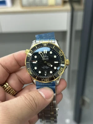Omega Seamaster Diver 300M 210.20.42.20.01.002 held in hand