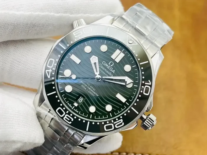 Dark green dial from the left, luminous dot markers