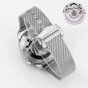 Mesh bracelet clasp and clear back, movement inset in the corner