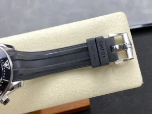 Black rubber strap on the cushion, buckle signed Omega