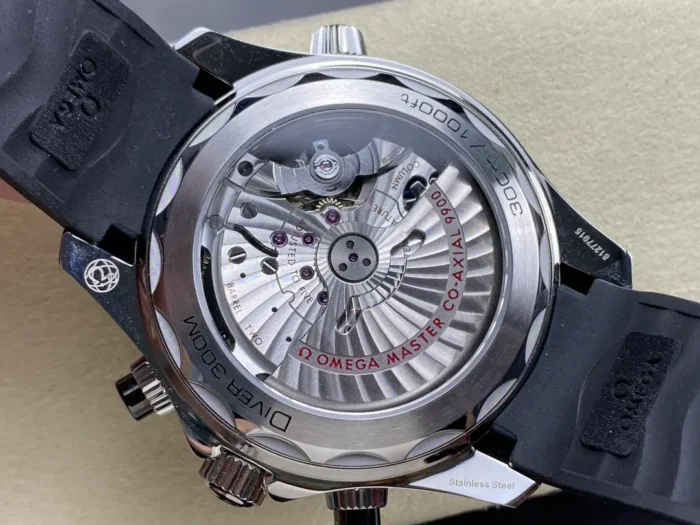 Clear caseback showing the rotor, black rubber strap on both ends