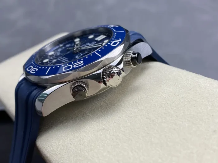Crown side with both pushers, blue rubber strap below