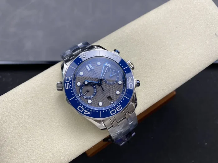 Grey dial chronograph on a cushion, seen from the left