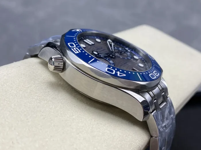 Case flank opposite the crown, blue bezel above