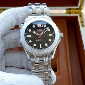 On the link bracelet in a white glove, brushed grey bezel