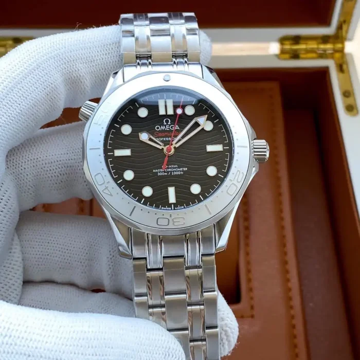 On the link bracelet in a white glove, brushed grey bezel