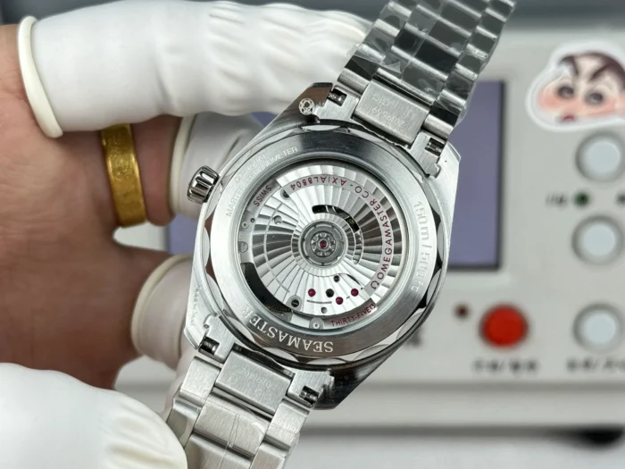 Clear caseback with Seamaster engraving and the rotor