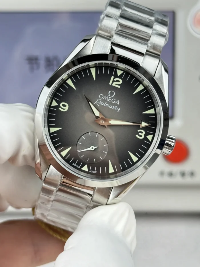 Close-up of the fume dial, small seconds at 6 and numerals 3 9 12