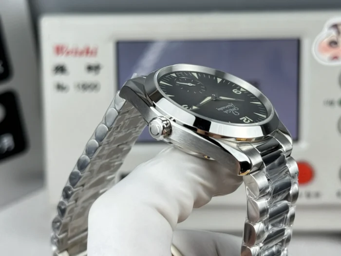Crown side at an angle, bracelet links curving