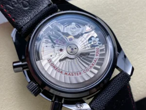 Display caseback with a decorated rotor and red lettering, red stitched strap