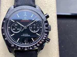 Close-up of the black dial with two subdials, date at 6 and the tachymeter scale