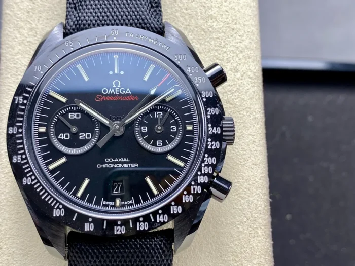 Close-up of the black dial with two subdials, date at 6 and the tachymeter scale